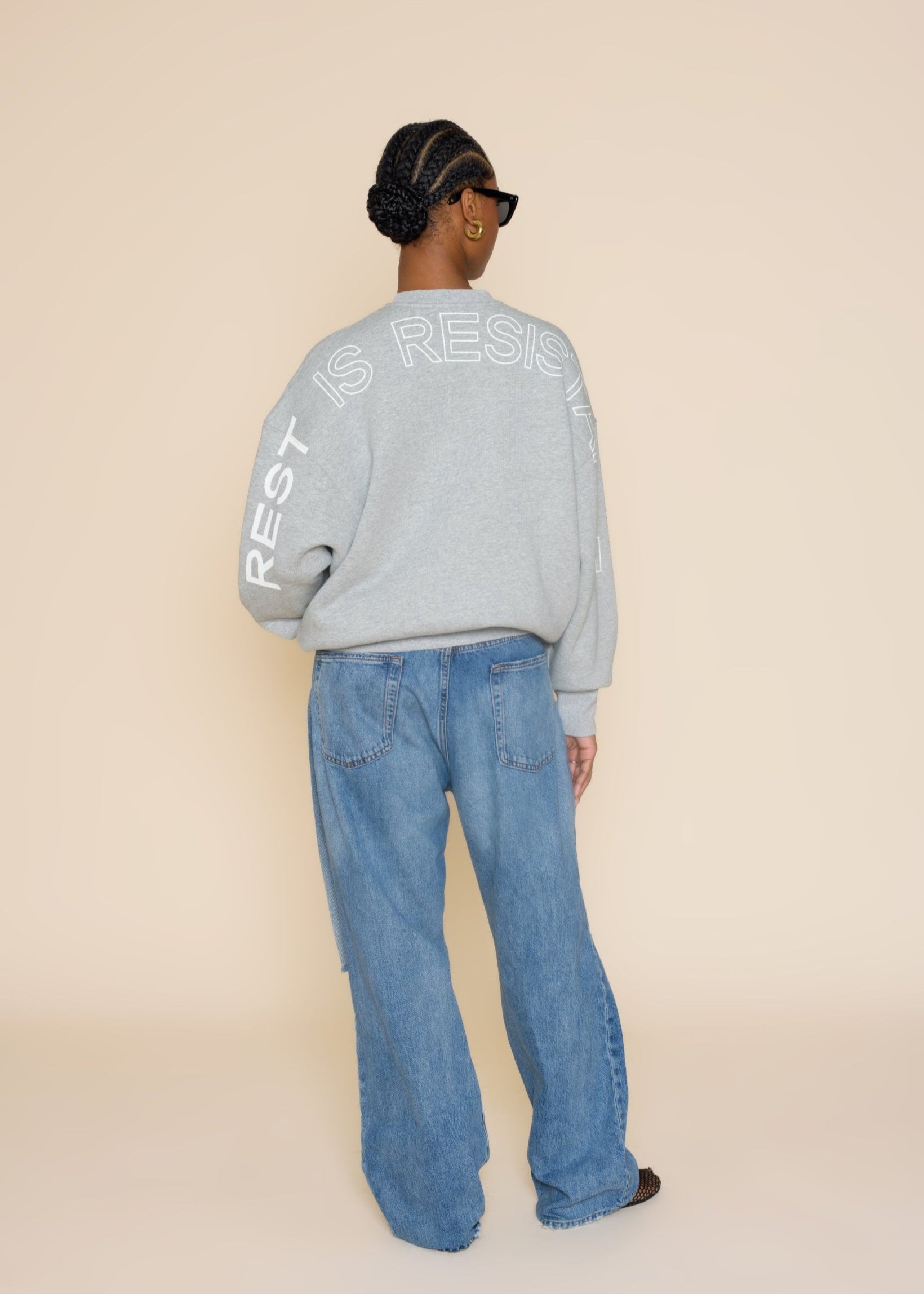 'REST IS RESISTANCE' SWEATSHIRT