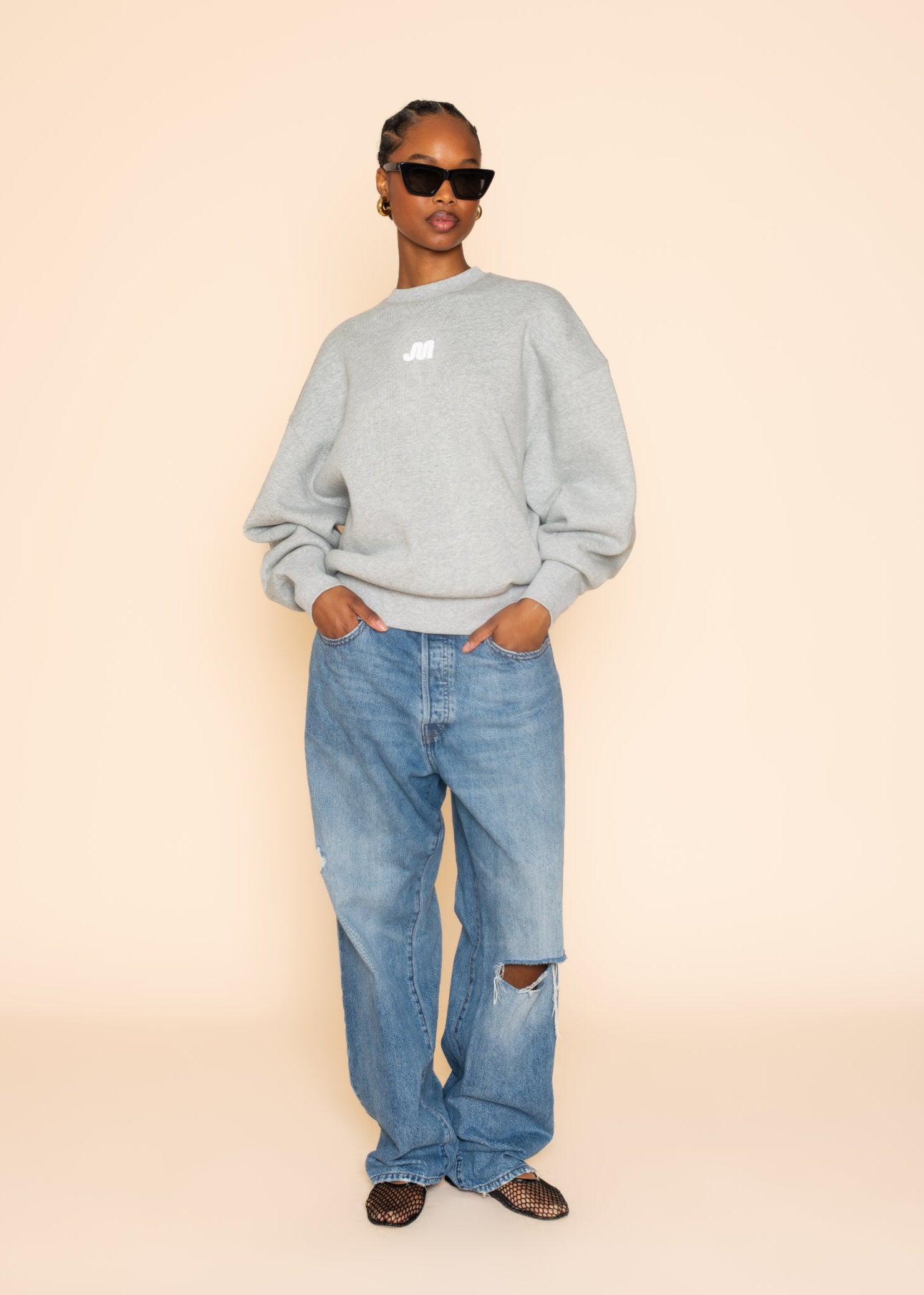 'REST IS RESISTANCE' SWEATSHIRT
