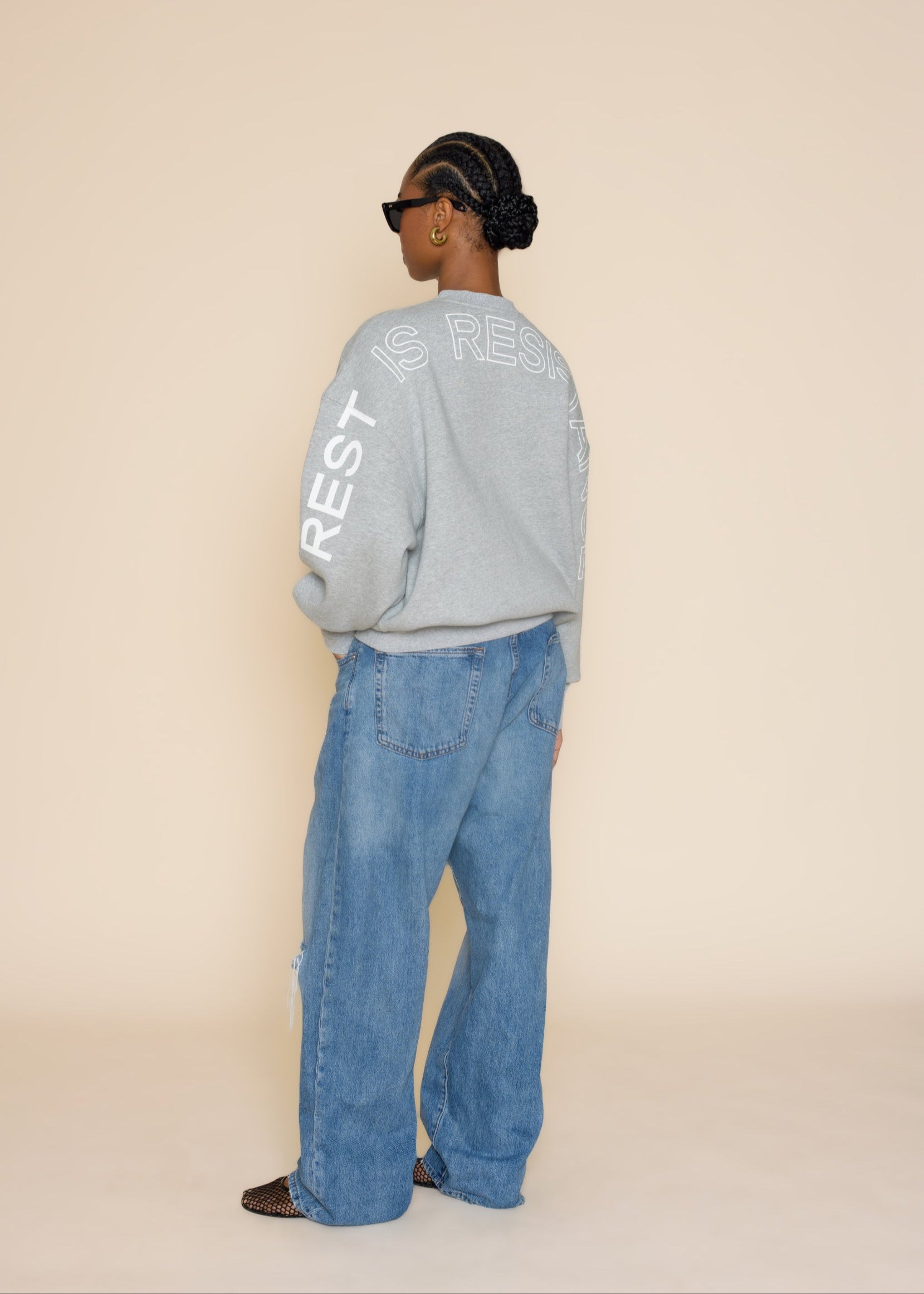 'REST IS RESISTANCE' SWEATSHIRT