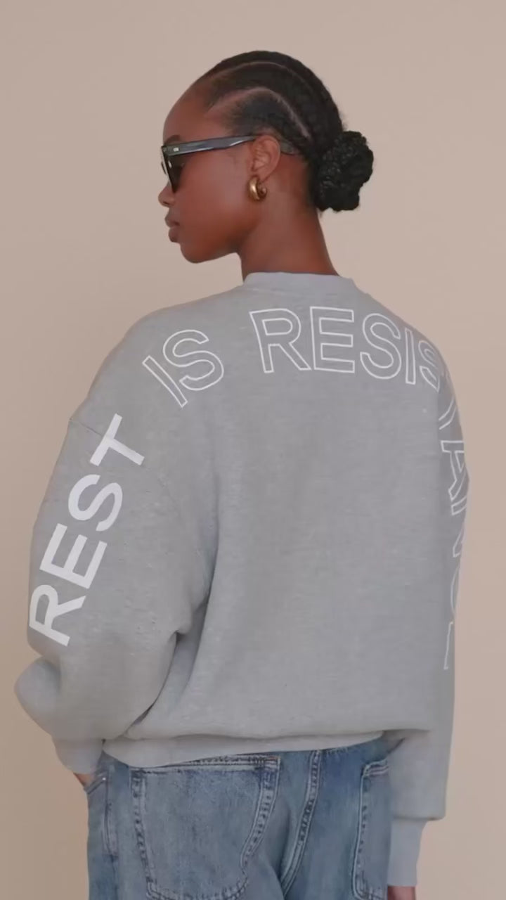 'REST IS RESISTANCE' SWEATSHIRT